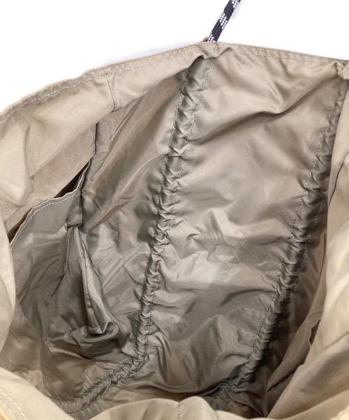 NOMADIS（ノマディス）NOMADIS (ノマディス) ナイロントートバッグ ベージュの古着・服飾アイテム