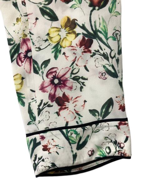 3.1 phillip lim（スリーワンフィリップリム）3.1 phillip lim (スリーワンフィリップリム) 総柄シルクパンツ アイボリーの古着・服飾アイテム