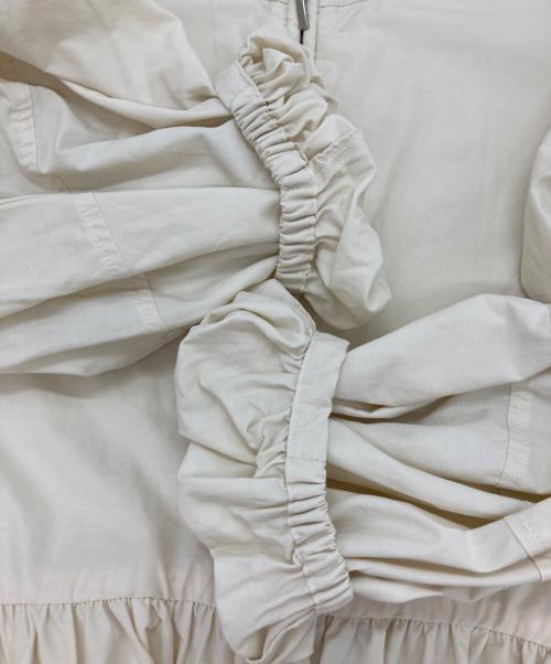 Adam et Rope（アダム エ ロペ）Adam et Rope (アダム エ ロペ) ペプラムジップブラウス ベージュ サイズ:FREEの古着・服飾アイテム