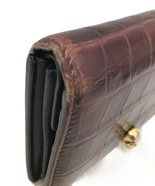 ALEXANDER McQUEEN（アレキサンダーマックイーン）ALEXANDER McQUEEN (アレキサンダーマックイーン) スカルトップクロコダイルウォレット ボルドーの古着・服飾アイテム