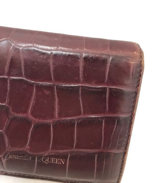 ALEXANDER McQUEEN（アレキサンダーマックイーン）ALEXANDER McQUEEN (アレキサンダーマックイーン) スカルトップクロコダイルウォレット ボルドーの古着・服飾アイテム