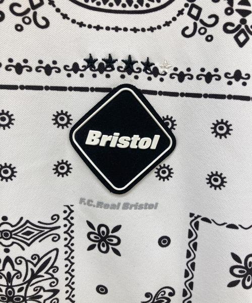 F.C.R.B.（エフシーレアルブリストル）F.C.R.B. (エフシーレアルブリストル) WHOLE PATTERN S/S MOCKNECK TOP ホワイト×ブラック サイズ:Lの古着・服飾アイテム