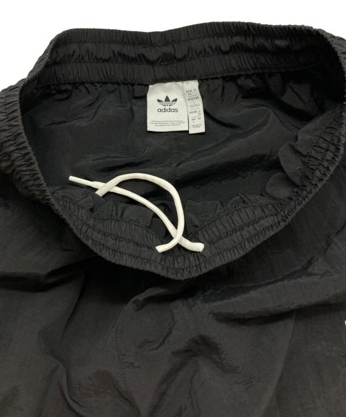 adidas（アディダス）adidas (アディダス) NTS Radio (NTSラジオ) ナイロントラックパンツ ブラック サイズ:XLの古着・服飾アイテム