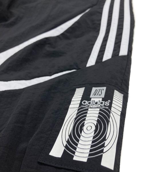 adidas（アディダス）adidas (アディダス) NTS Radio (NTSラジオ) ナイロントラックパンツ ブラック サイズ:XLの古着・服飾アイテム