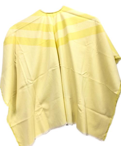 JOHNSTONS OF ELGIN（ジョンストンズオブエルガン）JOHNSTONS OF ELGIN (ジョンストンズオブエルガン) ポンチョ型ストール イエロー 未使用品の古着・服飾アイテム