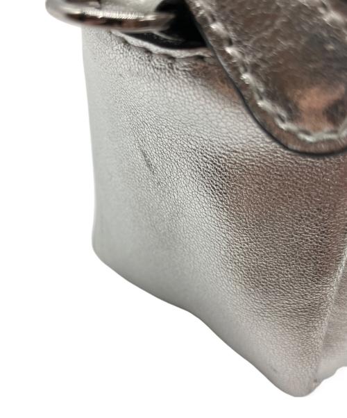 J&M DAVIDSON（ジェイ＆エム デヴィッドソン）J&M DAVIDSON (ジェイ＆エム デヴィッドソン) リップスティックポシェット シルバーの古着・服飾アイテム