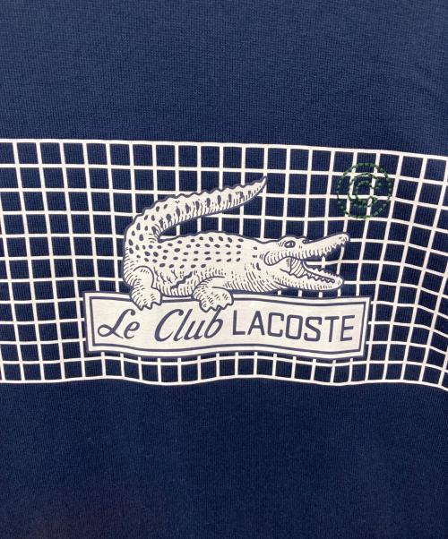 LACOSTE（ラコステ）LACOSTE (ラコステ) クラシックテニスプリントルーズフィットTシャツ ネイビー サイズ:Sの古着・服飾アイテム