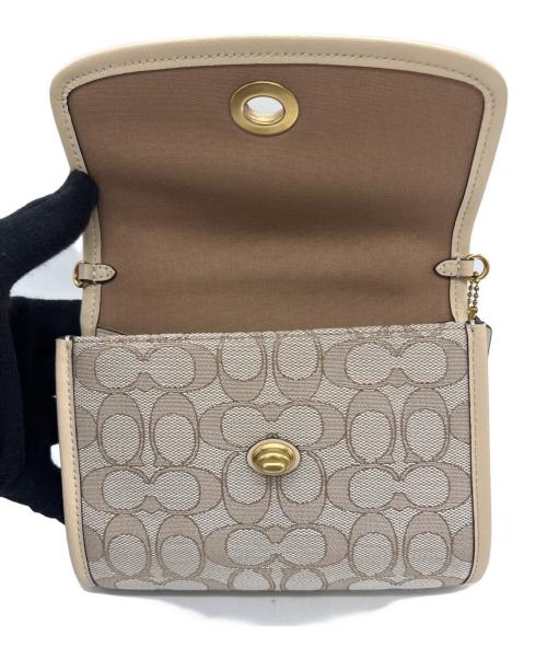 COACH（コーチ）COACH (コーチ) キップターンロッククロスボディ バッグ ベージュの古着・服飾アイテム