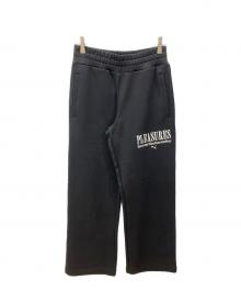 PUMA×PLEASURES（プーマ×プレジャーズ）の古着「スウェットパンツ」｜ブラック