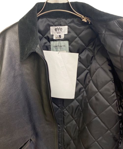 eYe COMME des GARCONS JUNYAWATANABE MAN（アイ コム デ ギャルソン ジュンヤ ワタナベ マン）eYe COMME des GARCONS JUNYAWATANABE MAN (アイ コム デ ギャルソン ジュンヤ ワタナベ マン) CarHartt (カーハート) 24AW レザー×綿コーデュロイ ブラック サイズ:Sの古着・服飾アイテム