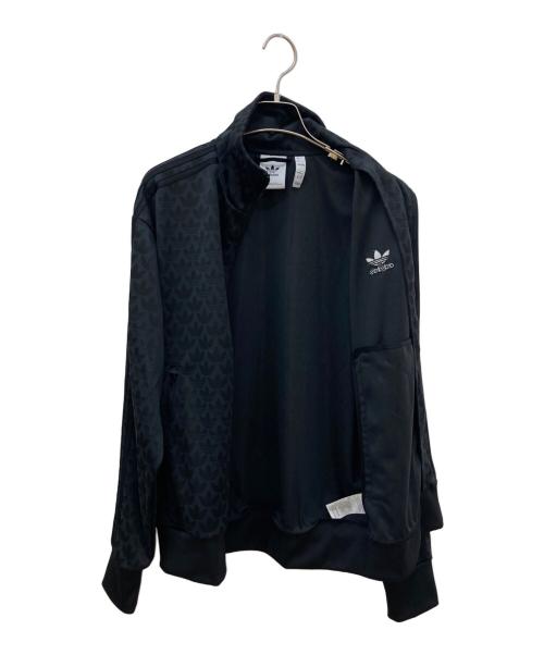 adidas Originals（アディダスオリジナル）adidas originals (アディダスオリジナル) モノグラムトラックジャケット ブラック サイズ:Mの古着・服飾アイテム