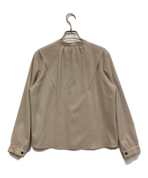 UNITED TOKYO（ユナイテッドトーキョー）UNITED TOKYO (ユナイテッドトーキョー) ケープカラーブラウス ベージュ サイズ:FREEの古着・服飾アイテム