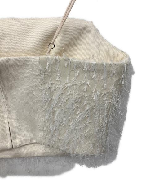 CLANE（クラネ）CLANE (クラネ) FRINGE BARE BUSTIER アイボリーの古着・服飾アイテム