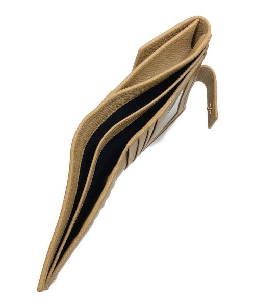 Salvatore Ferragamo（サルヴァトーレ フェラガモ）Salvatore Ferragamo (サルヴァトーレ フェラガモ) ダブルガンチーニ レザーコンパクトウォレット ベージュの古着・服飾アイテム