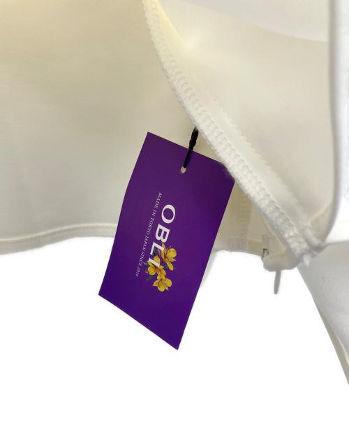 OBLI（オブリ）OBLI (オブリ) フリルダブルクロスブラウス ホワイト サイズ:SIZE Free 未使用品の古着・服飾アイテム