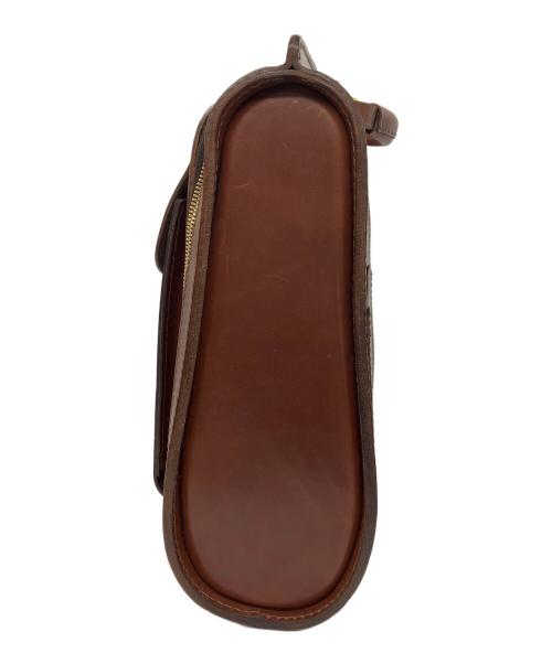 Herz（ヘルツ）Herz (ヘルツ) 流線型リュック ブラウンの古着・服飾アイテム