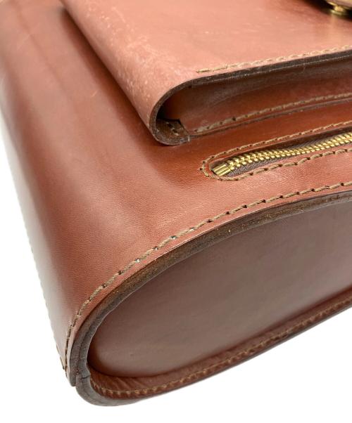 Herz（ヘルツ）Herz (ヘルツ) 流線型リュック ブラウンの古着・服飾アイテム