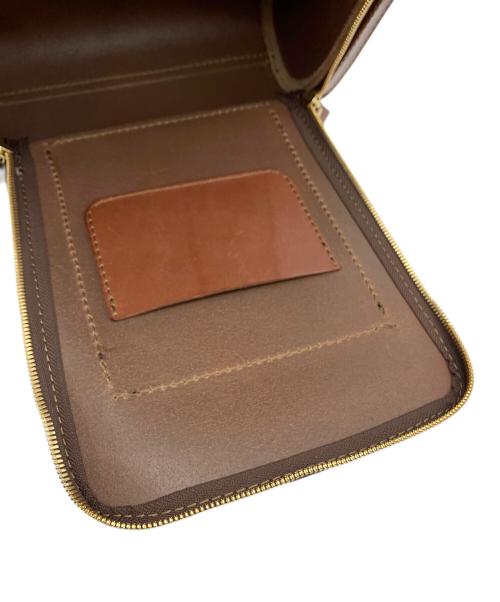 Herz（ヘルツ）Herz (ヘルツ) 流線型リュック ブラウンの古着・服飾アイテム