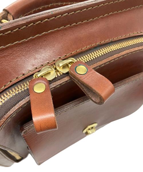 Herz（ヘルツ）Herz (ヘルツ) 流線型リュック ブラウンの古着・服飾アイテム