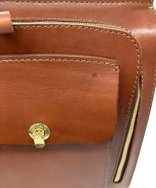 Herz（ヘルツ）Herz (ヘルツ) 流線型リュック ブラウンの古着・服飾アイテム