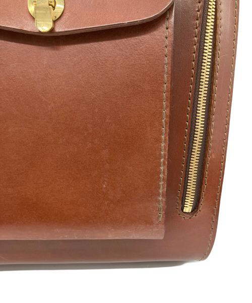 Herz（ヘルツ）Herz (ヘルツ) 流線型リュック ブラウンの古着・服飾アイテム