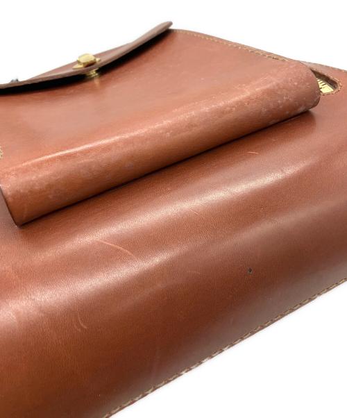 Herz（ヘルツ）Herz (ヘルツ) 流線型リュック ブラウンの古着・服飾アイテム