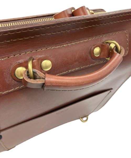 Herz（ヘルツ）Herz (ヘルツ) 流線型リュック ブラウンの古着・服飾アイテム