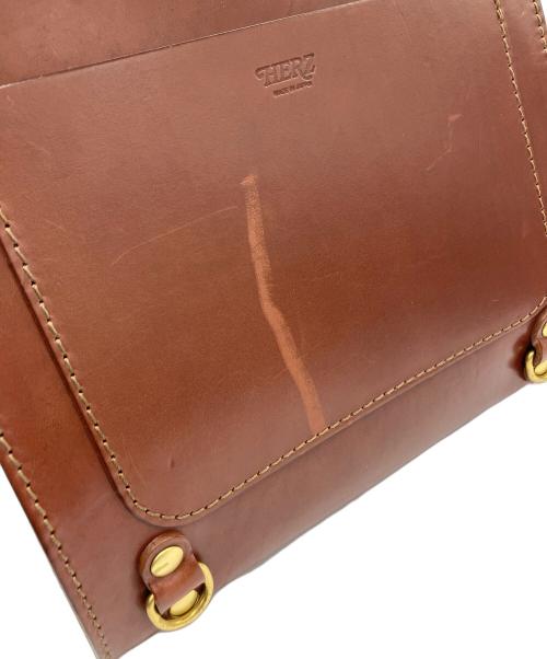 Herz（ヘルツ）Herz (ヘルツ) 流線型リュック ブラウンの古着・服飾アイテム