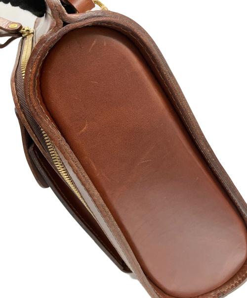 Herz（ヘルツ）Herz (ヘルツ) 流線型リュック ブラウンの古着・服飾アイテム