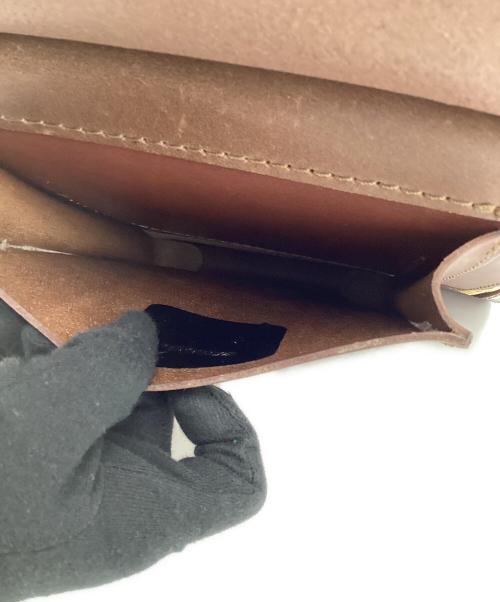 Herz（ヘルツ）Herz (ヘルツ) 流線型リュック ブラウンの古着・服飾アイテム