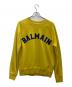 BALMAIN（バルマン）の古着「Universityロゴ スウェット」｜イエロー