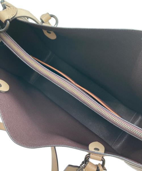 COACH（コーチ）COACH (コーチ) タイラー キャリーオール/2WAYショルダーバッグ ベージュの古着・服飾アイテム