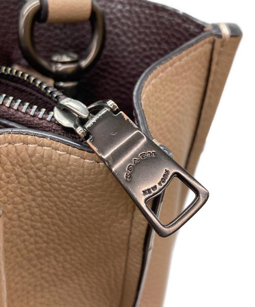 COACH（コーチ）COACH (コーチ) タイラー キャリーオール/2WAYショルダーバッグ ベージュの古着・服飾アイテム