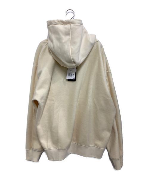 NIKE SB（ナイキエスビー）NIKE SB (ナイキエスビー) プルオーバーパーカー グラフィック ベージュ サイズ:2XL 未使用品の古着・服飾アイテム
