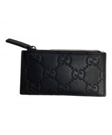 GUCCI（グッチ）の古着「GGラバーエフェクト ジップカードケース」｜ブラック