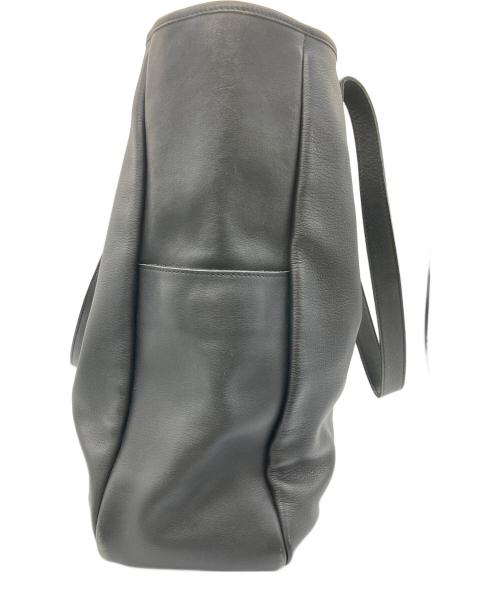 ALEXANDER McQUEEN（アレキサンダーマックイーン）ALEXANDER McQUEEN (アレキサンダーマックイーン) パンチングスカルトートバッグ ブラックの古着・服飾アイテム
