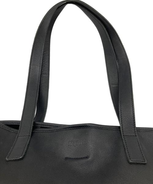 ALEXANDER McQUEEN（アレキサンダーマックイーン）ALEXANDER McQUEEN (アレキサンダーマックイーン) パンチングスカルトートバッグ ブラックの古着・服飾アイテム
