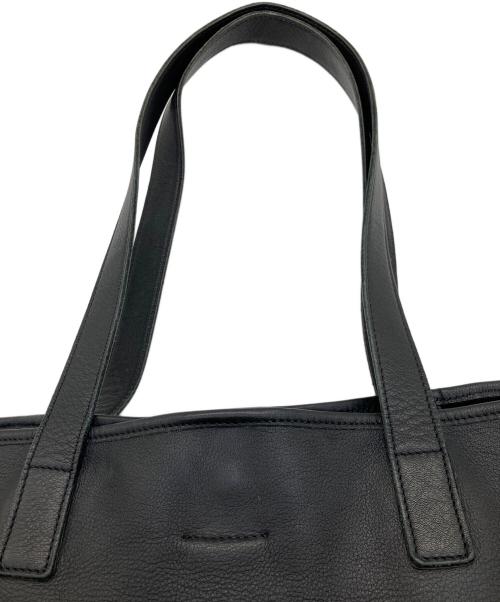 ALEXANDER McQUEEN（アレキサンダーマックイーン）ALEXANDER McQUEEN (アレキサンダーマックイーン) パンチングスカルトートバッグ ブラックの古着・服飾アイテム