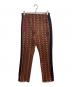 Needles（ニードルズ）の古着「TRACK NARROW PANT PAISLEY」｜レッド×イエロー