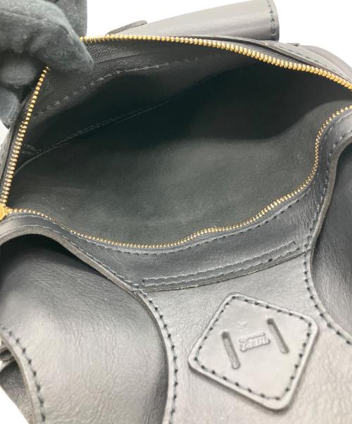 Herz（ヘルツ）Herz (ヘルツ) 着る鞄・ポケット付 ブラックの古着・服飾アイテム