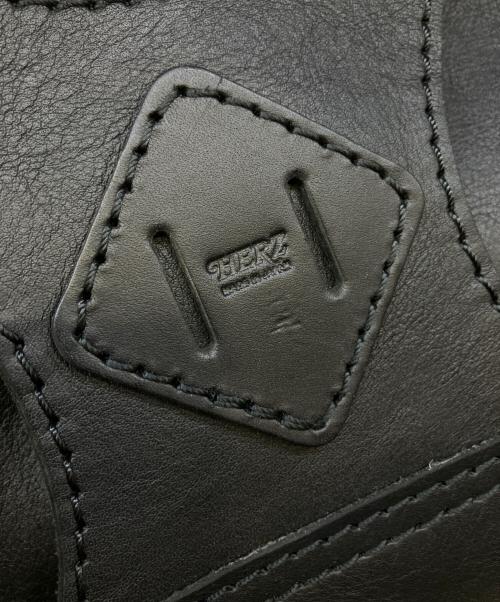 Herz（ヘルツ）Herz (ヘルツ) 着る鞄・ポケット付 ブラックの古着・服飾アイテム