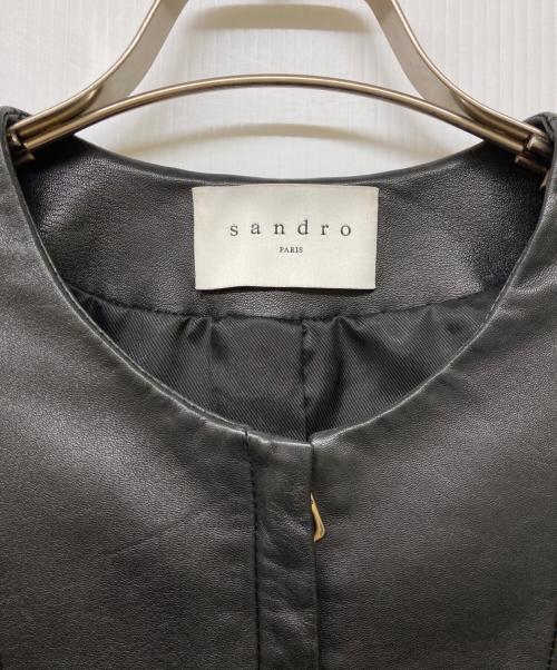 Sandro（サンドロ）Sandro (サンドロ) シープスキンベルテッドノーカラーレザージャケット ブラック サイズ:1の古着・服飾アイテム