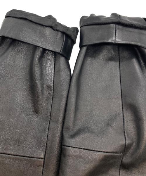 Sandro（サンドロ）Sandro (サンドロ) シープスキンベルテッドノーカラーレザージャケット ブラック サイズ:1の古着・服飾アイテム