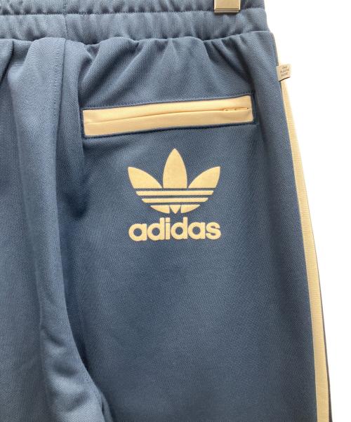 adidas（アディダス）adidas (アディダス) グラフィックス メローライドクラブ ベッケンバウアー トラックパンツ ネイビー サイズ:Sの古着・服飾アイテム