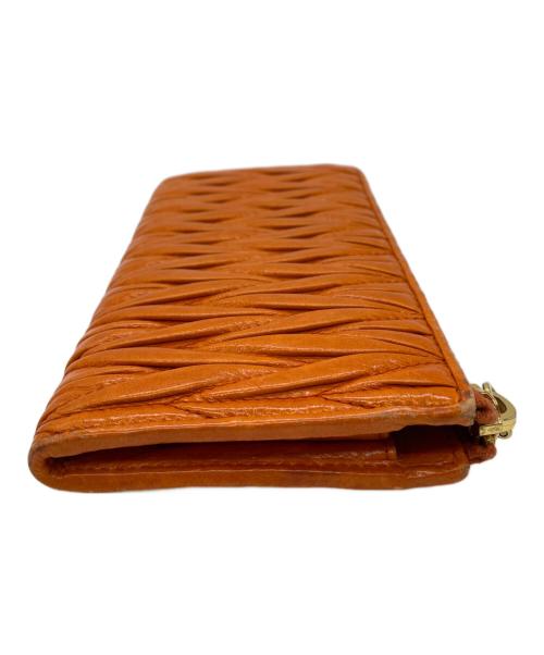MIU MIU（ミュウミュウ）MIU MIU (ミュウミュウ) マテラッセL字ファスナー長財布 オレンジの古着・服飾アイテム