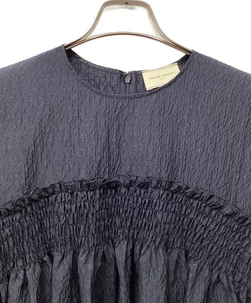 UNITED ARROWS（ユナイテッドアローズ）UNITED ARROWS (ユナイテッドアローズ) エアリージャカード シャーリング フレアスリーブ ブラウス ネイビー サイズ:Freeの古着・服飾アイテム