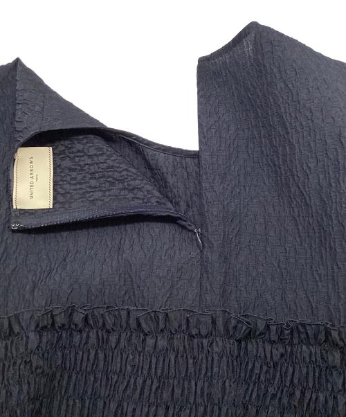 UNITED ARROWS（ユナイテッドアローズ）UNITED ARROWS (ユナイテッドアローズ) エアリージャカード シャーリング フレアスリーブ ブラウス ネイビー サイズ:Freeの古着・服飾アイテム