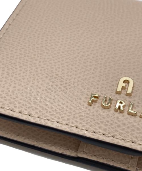 FURLA（フルラ）FURLA (フルラ) カメリア 2つ折り財布 ピンクの古着・服飾アイテム