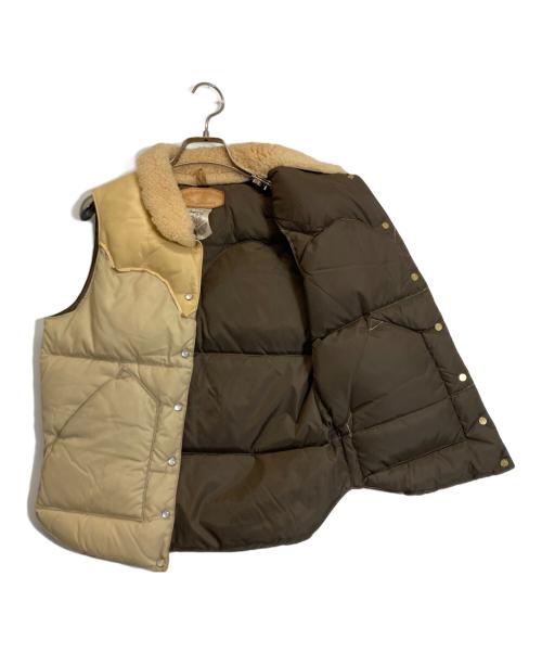RockyMountainFeatherBed（ロッキーマウンテンフェザーベッド）RockyMountainFeatherBed (ロッキーマウンテンフェザーベッド) レザー切替ダウンベスト ベージュ サイズ:7/8の古着・服飾アイテム