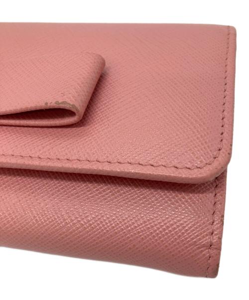 PRADA（プラダ）PRADA (プラダ) リボンZIP長財布　サフィアーノ ピンクの古着・服飾アイテム
